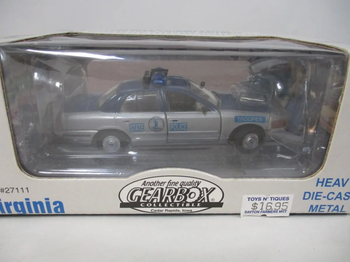 /img/49858-diecast-police-car-display.webp
