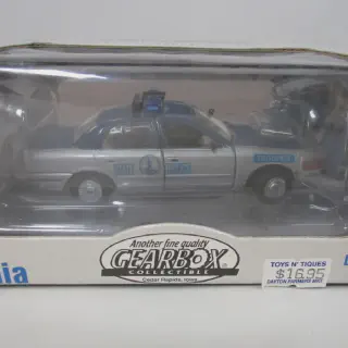 /img/49858-diecast-police-car-display.webp